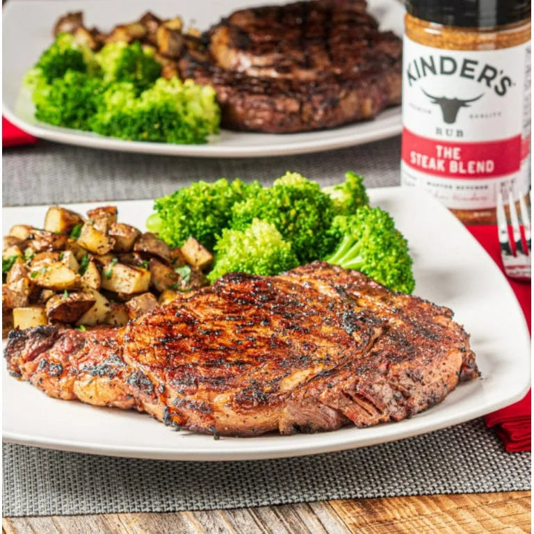 Lifestyle/use image: Kinder's The Steak Blend Seasoning used on steaks burgers and grilled foods 362g