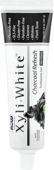 NOW Solutions Xyliwhite Charcoal Toothpaste Gel tube, 181g, on white background.