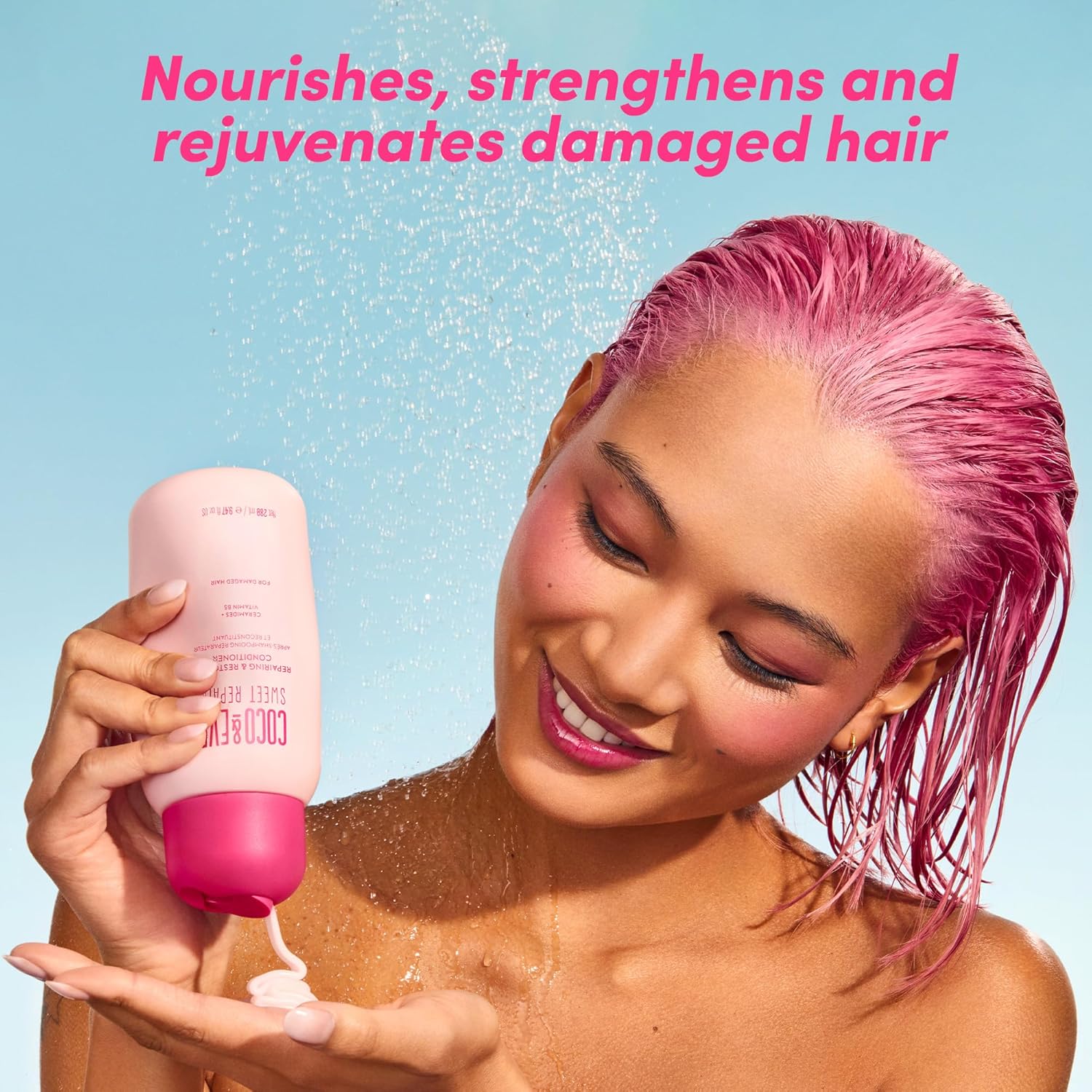 How to Use: Applying Coco & Eve Sweet Repair Conditioner to wet hair ends.