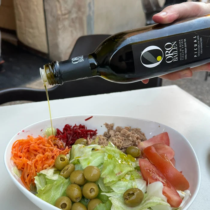 Oro Bailen Picual Extra Virgin Olive Oil 750ml drizzled over a salad or prepared dish