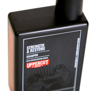 Side image: Uppercut Deluxe Strength and Restore Shampoo 240ml bottle mandarin patchouli fragrance packaging