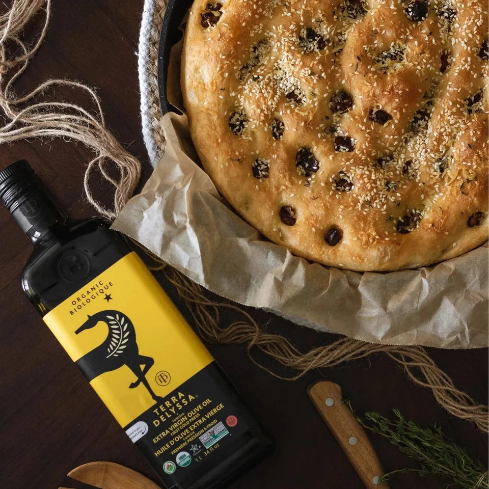 Lifestyle/use image: Terra Delyssa olive oil used on salads and dishes 1L